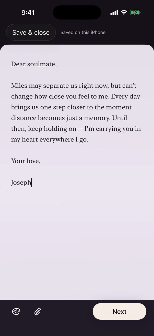 Writing a letter on lilac paper that begins "Dear soulmate".